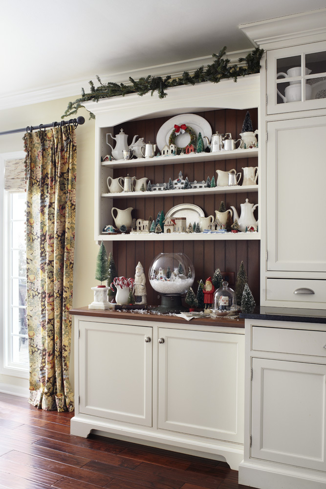 Tall kitchen cabinets next to shelves