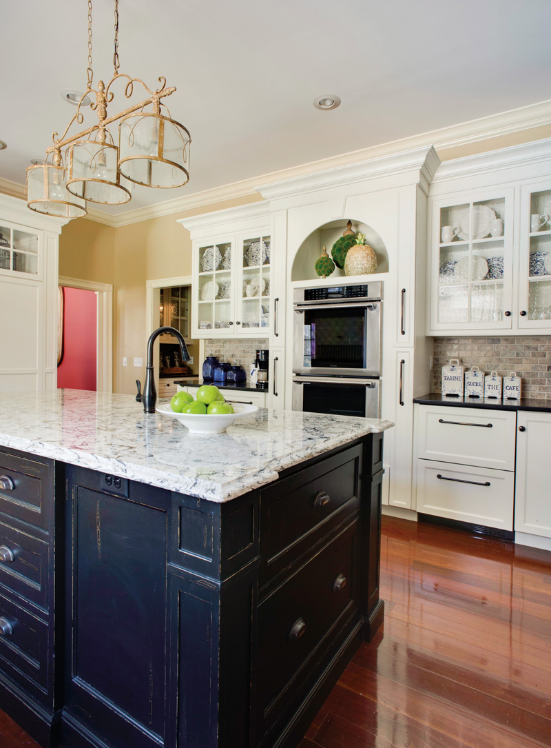 White cabinets with wood floor